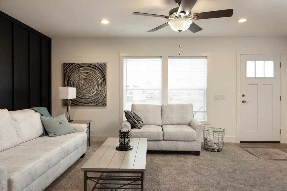 The HEY JUDE Living Room. This Manufactured Mobile Home features 4 bedrooms and 2 baths.