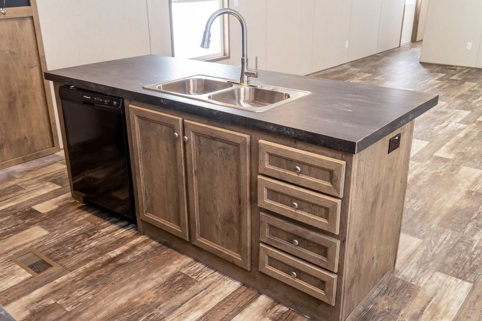 The THE BREEZE Exterior. This Manufactured Mobile Home features 3 bedrooms and 2 baths.