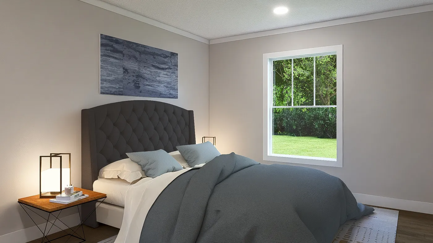 The BORN TO RUN Primary Bedroom. This Manufactured Mobile Home features 2 bedrooms and 2 baths.