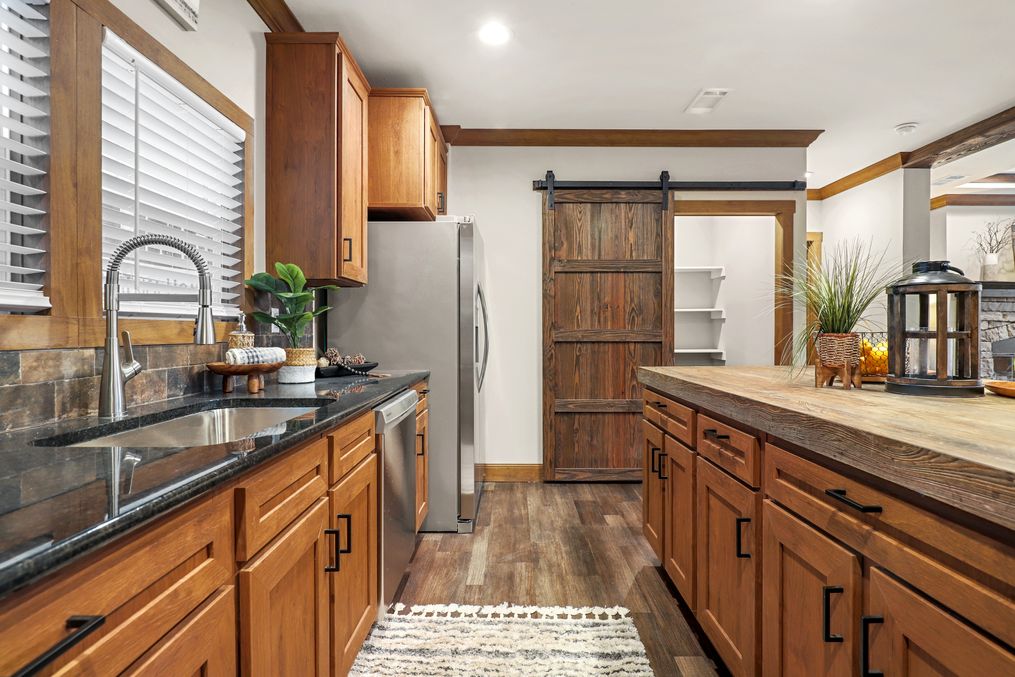 The THE DURANGO Kitchen. This Manufactured Mobile Home features 3 bedrooms and 2 baths.