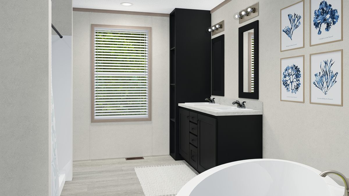 The 7228-5789 THE PULSE Primary Bathroom. This Manufactured Mobile Home features 3 bedrooms and 2 baths.