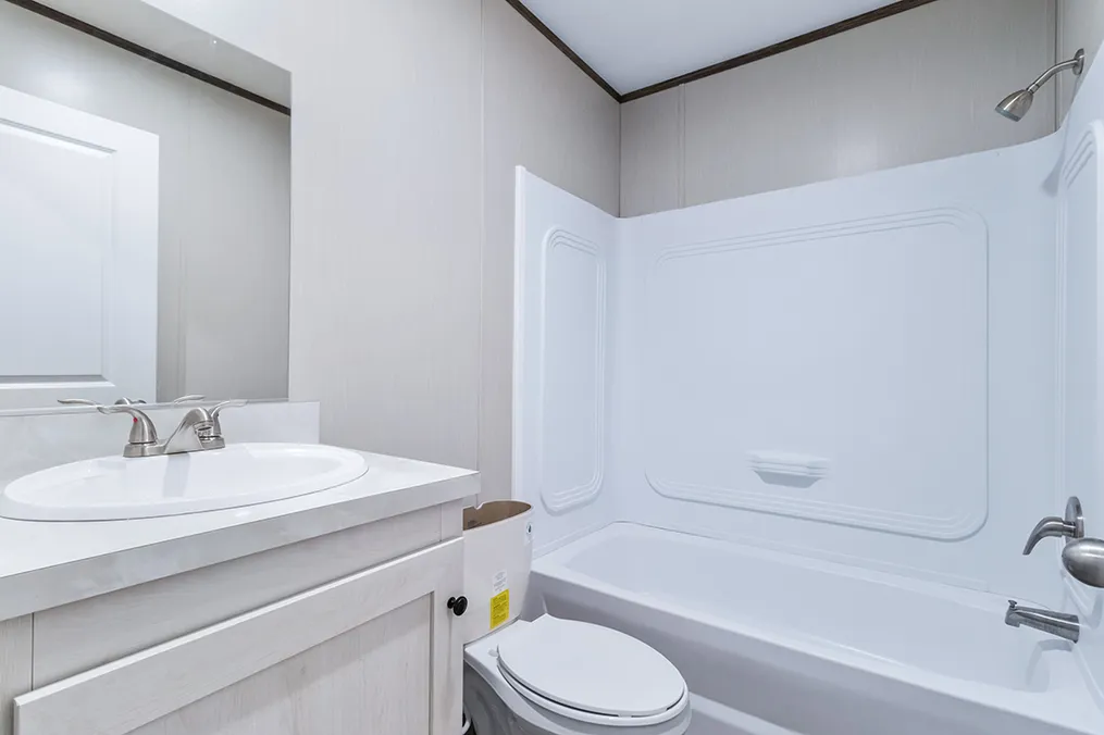 The SELECT 16723A Guest Bathroom. This Manufactured Mobile Home features 3 bedrooms and 2 baths.