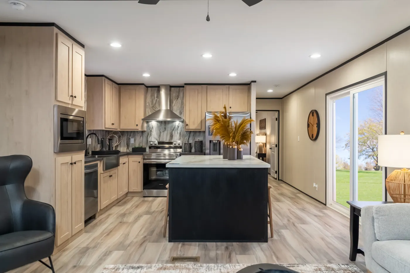 The THE SMOKEY Kitchen. This Manufactured Mobile Home features 3 bedrooms and 2 baths.