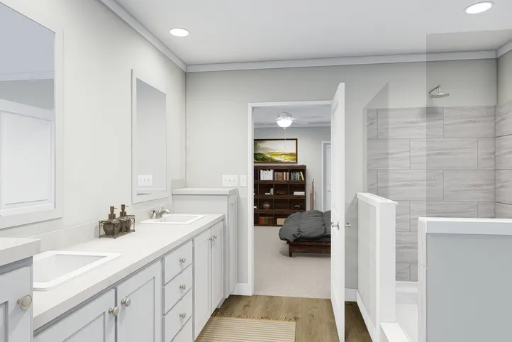 The REMINGTON Primary Bathroom. This Manufactured Mobile Home features 3 bedrooms and 2 baths.