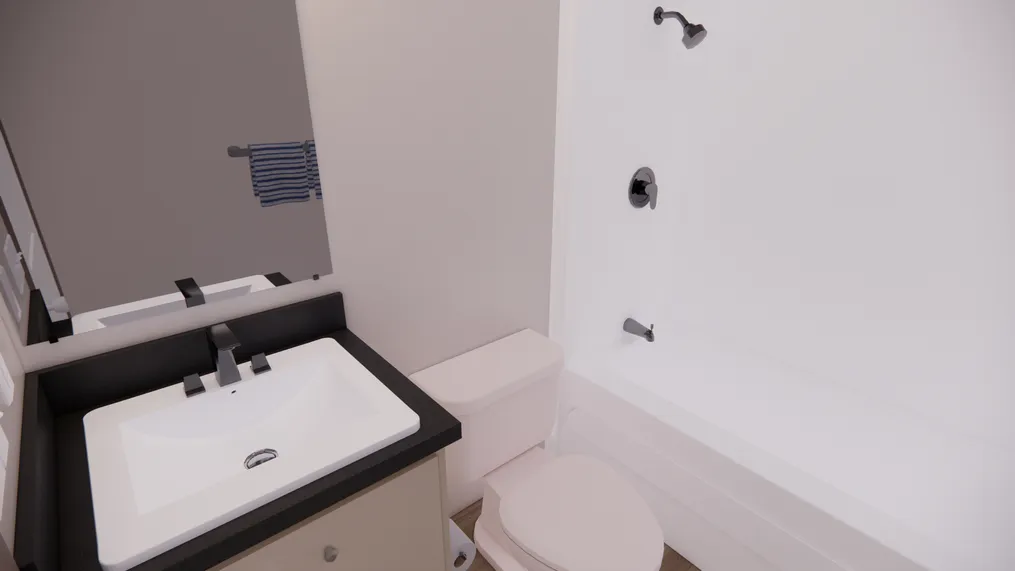 The 7616-4200 ADRENALINE Guest Bathroom. This Manufactured Mobile Home features 3 bedrooms and 2 baths.