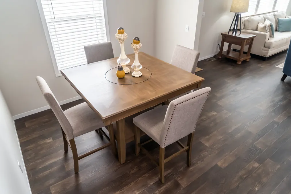 The MAVERICK 56A Dining Area. This Manufactured Mobile Home features 3 bedrooms and 2 baths.
