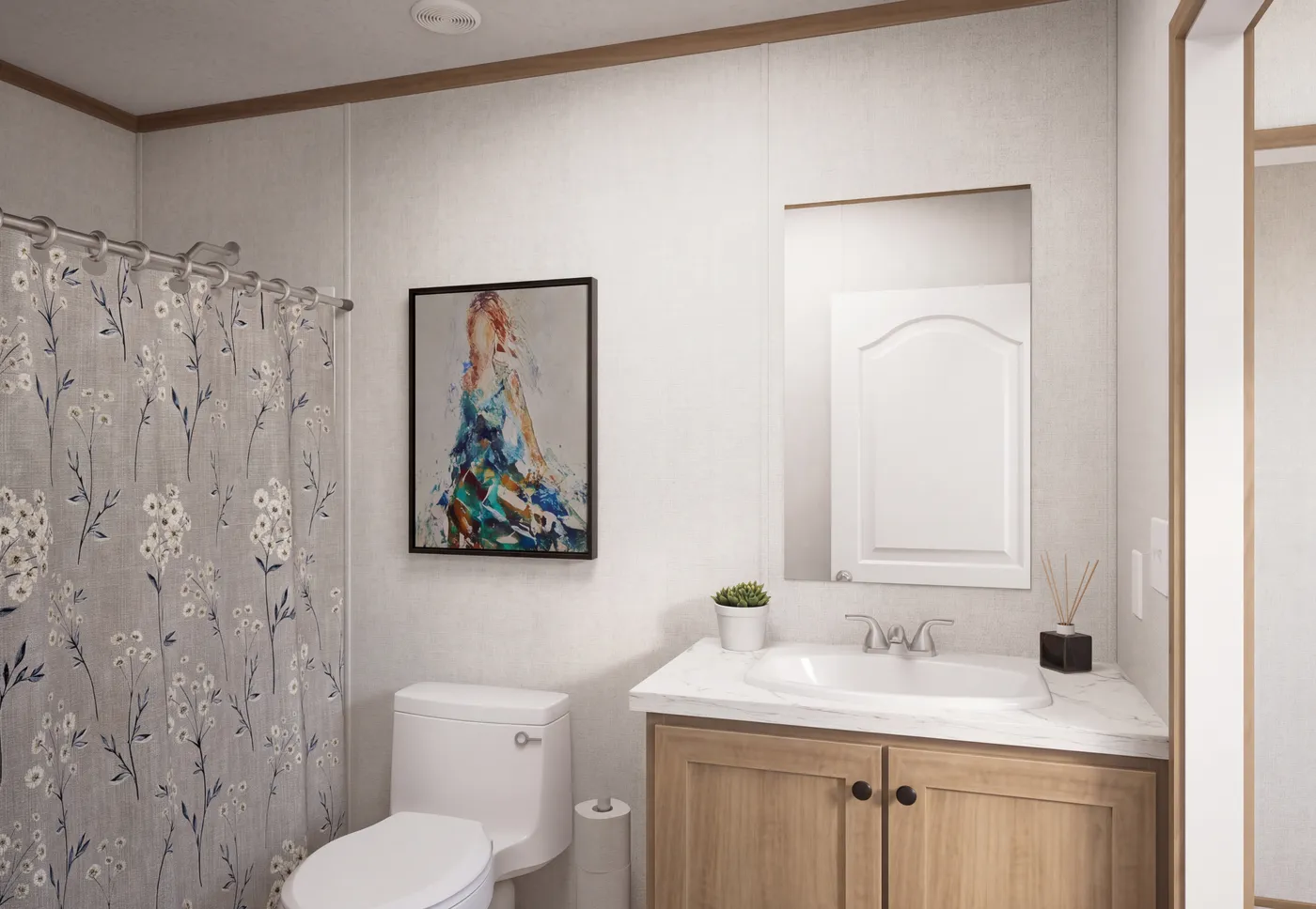 The THE MOUNTAINEER 68 Guest Bathroom. This Manufactured Mobile Home features 4 bedrooms and 2 baths.
