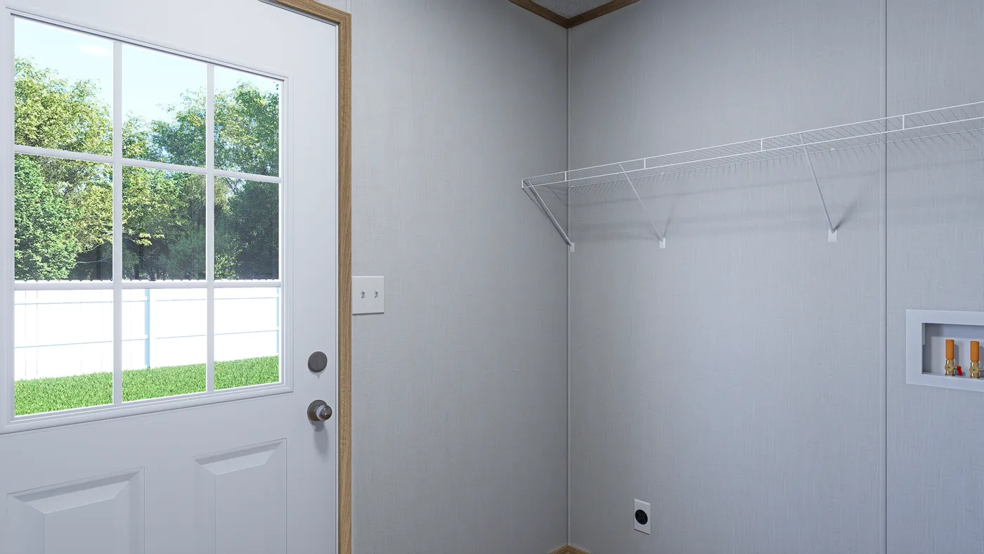The ECLIPSE Utility Room. This Manufactured Mobile Home features 4 bedrooms and 2 baths.