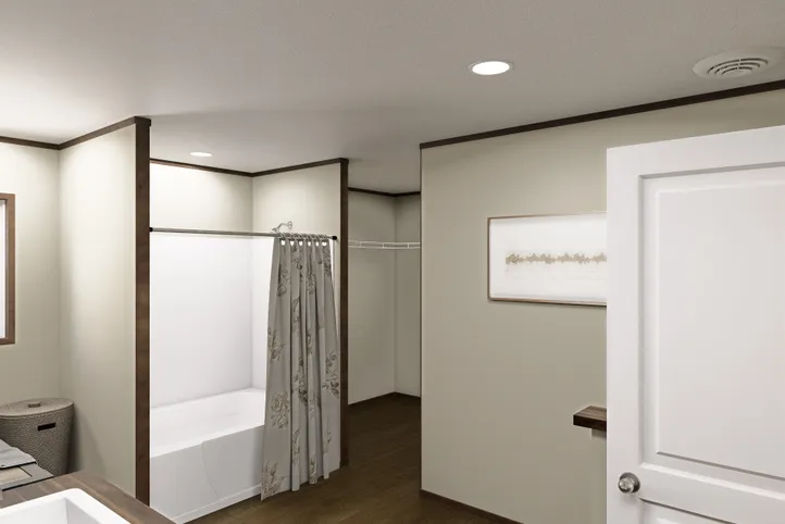 The EVEREST Primary Bathroom. This Manufactured Mobile Home features 4 bedrooms and 2 baths.