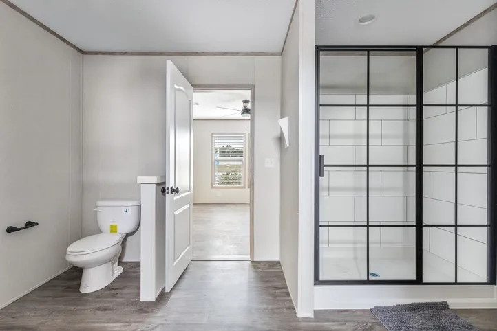 The STERLING XL ANNIVERSARY Primary Bathroom. This Manufactured Mobile Home features 3 bedrooms and 2 baths.