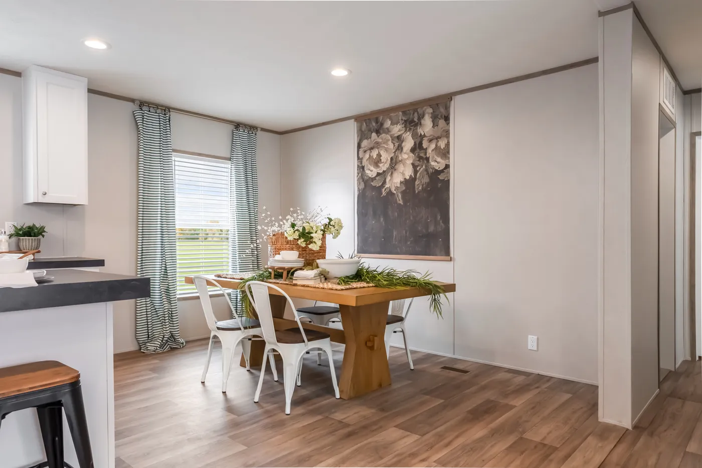 The VISTA Dining Area. This Manufactured Mobile Home features 3 bedrooms and 2 baths.