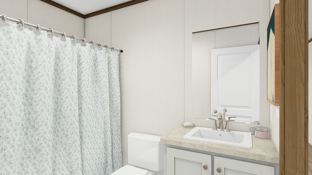 The SENSATION Guest Bathroom. This Manufactured Mobile Home features 3 bedrooms and 2 baths.