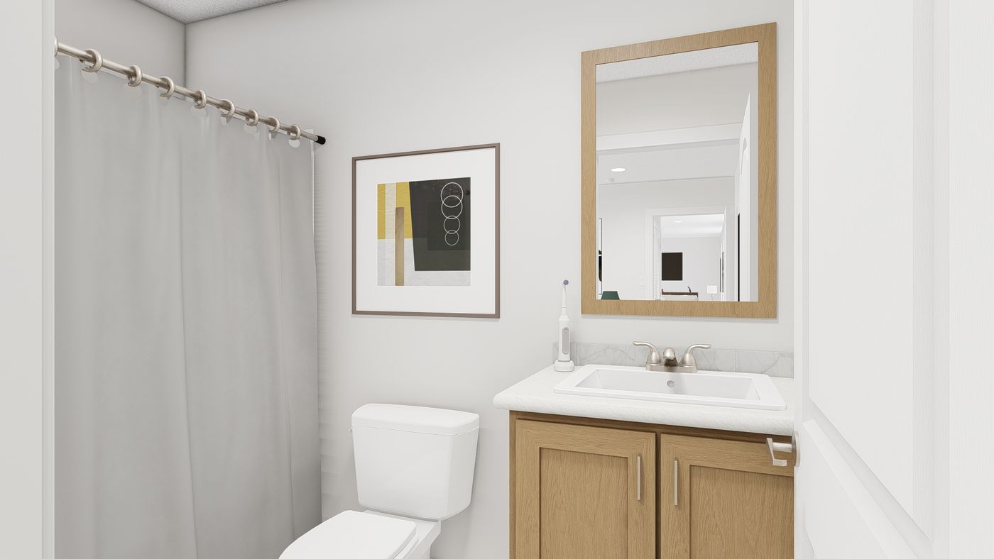 The RAMSEY 218-1 Primary Bathroom. This Manufactured Mobile Home features 3 bedrooms and 2 baths.
