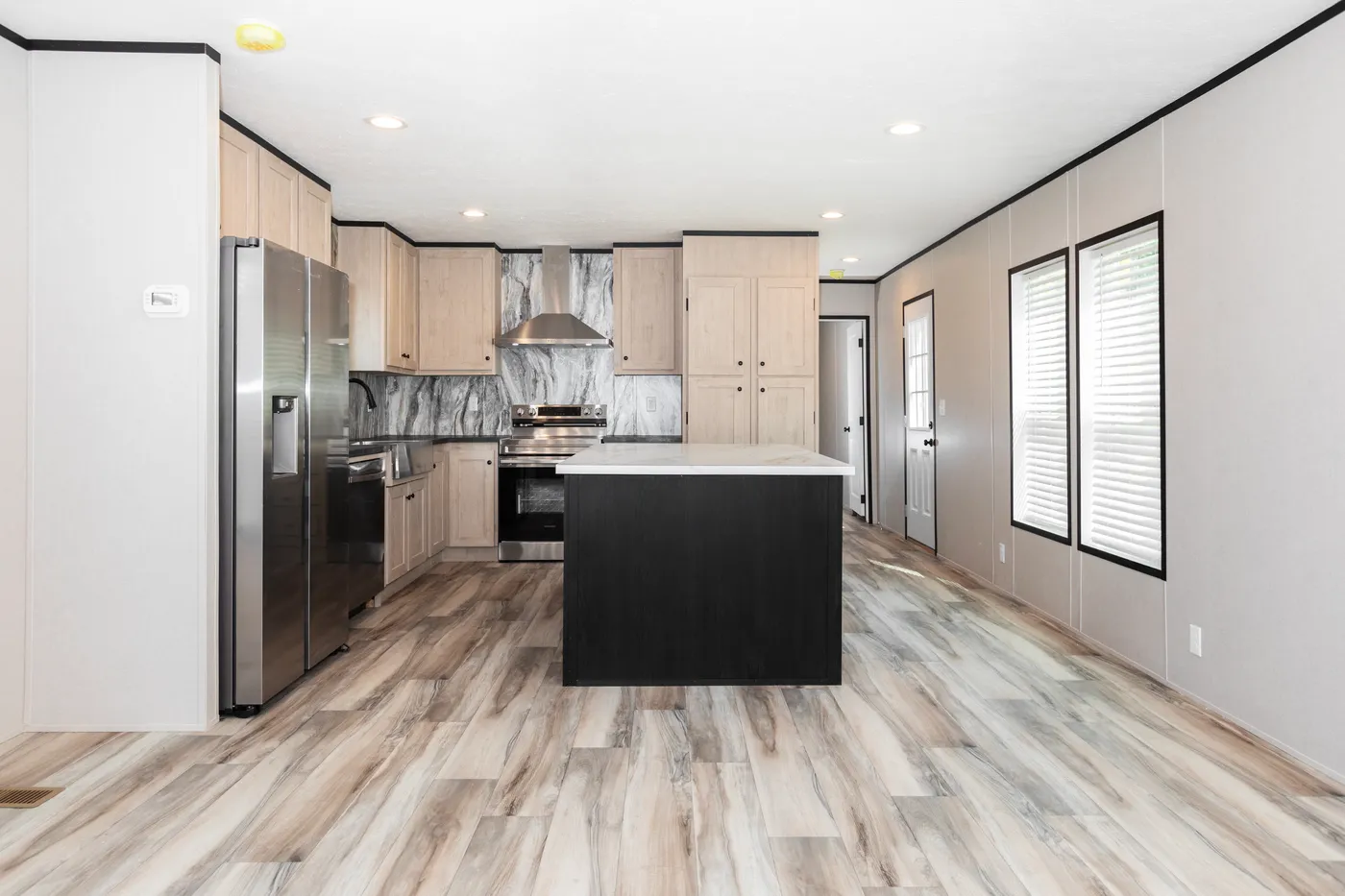 The THE FUJI Kitchen. This Manufactured Mobile Home features 3 bedrooms and 2 baths.