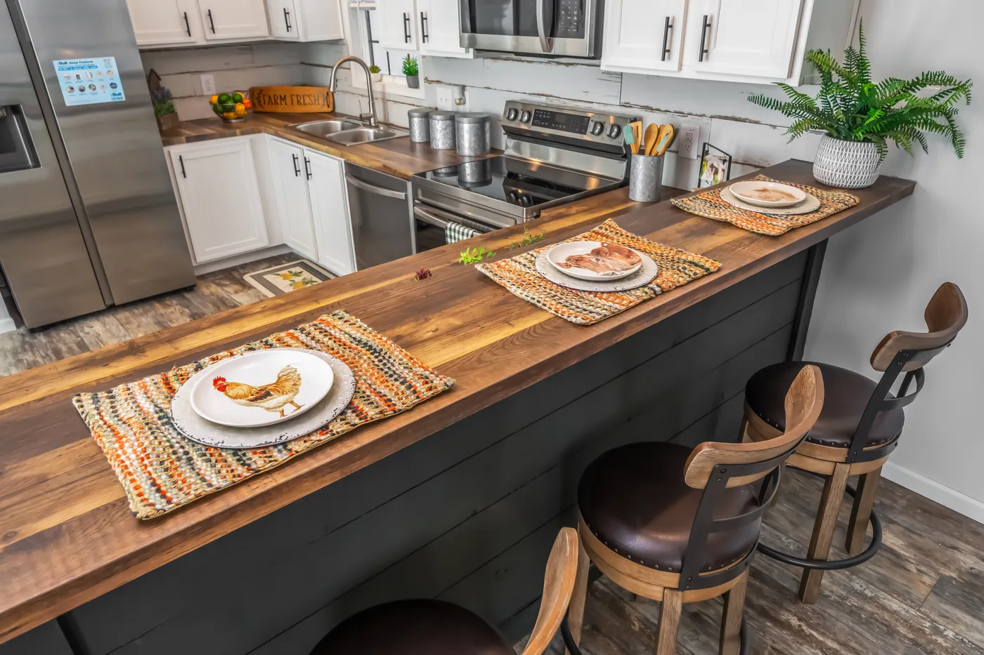 The THE MERCER Kitchen. This Manufactured Mobile Home features 3 bedrooms and 2 baths.