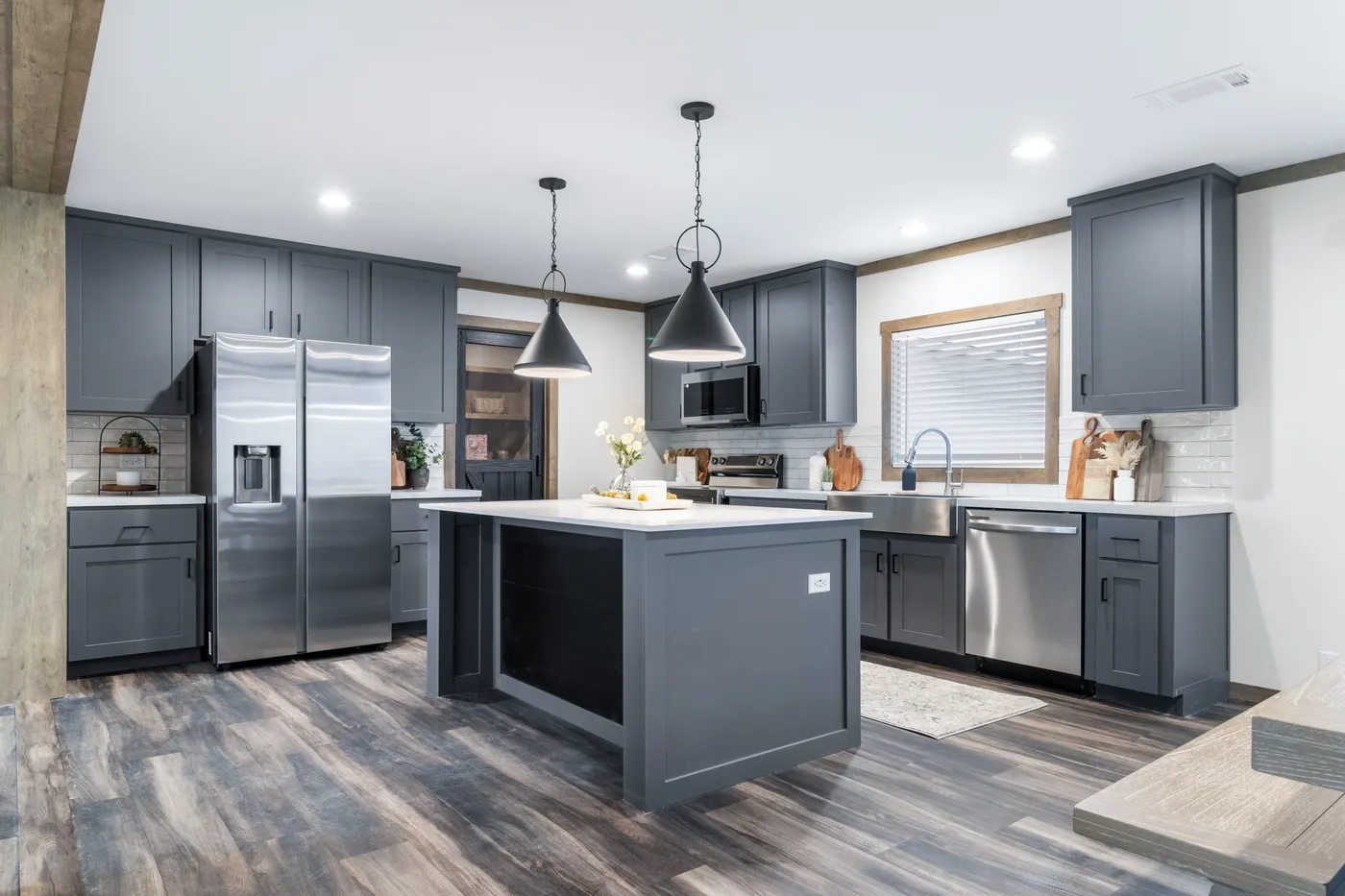 The EVERETT ELITE Kitchen. This Manufactured Mobile Home features 4 bedrooms and 3 baths.