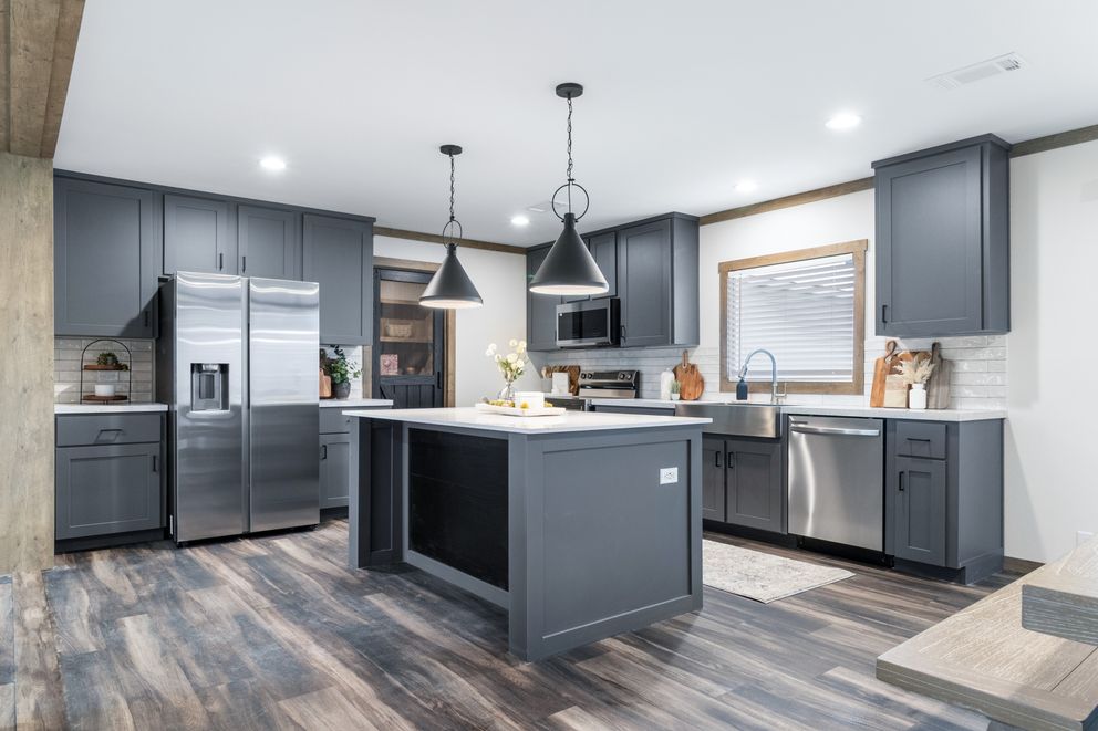 The EVERETT ELITE Kitchen. This Manufactured Mobile Home features 4 bedrooms and 3 baths.