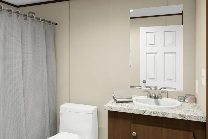 The TRIUMPH Guest Bathroom. This Manufactured Mobile Home features 5 bedrooms and 3 baths.
