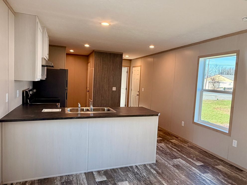 The JEFFERSON Kitchen. This Manufactured Mobile Home features 3 bedrooms and 2 baths.