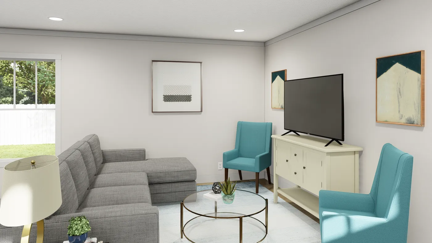 The 1003 "BORN TO RUN" 6016 Living Room. This Manufactured Mobile Home features 2 bedrooms and 2 baths.