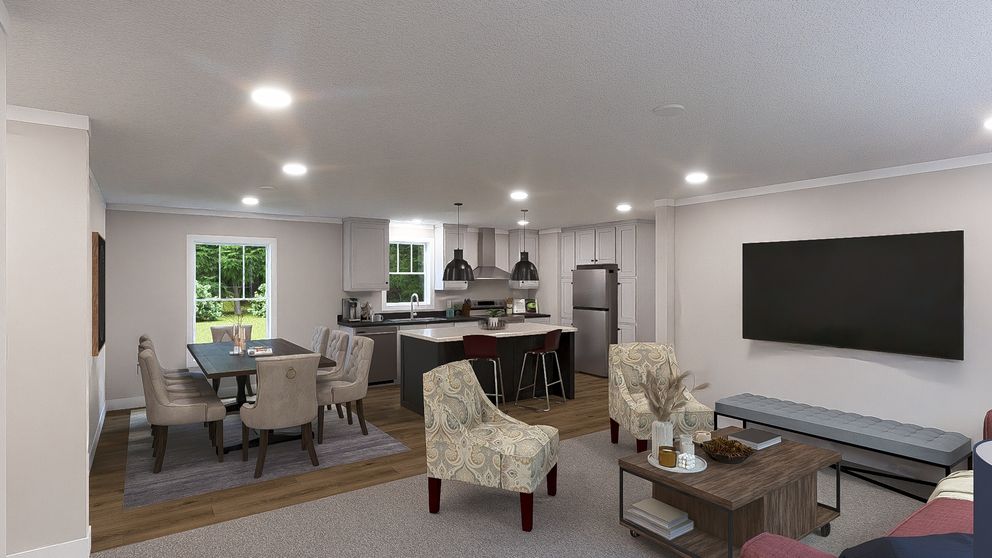 The LEAN ON ME Living Room. This Manufactured Mobile Home features 3 bedrooms and 2 baths.