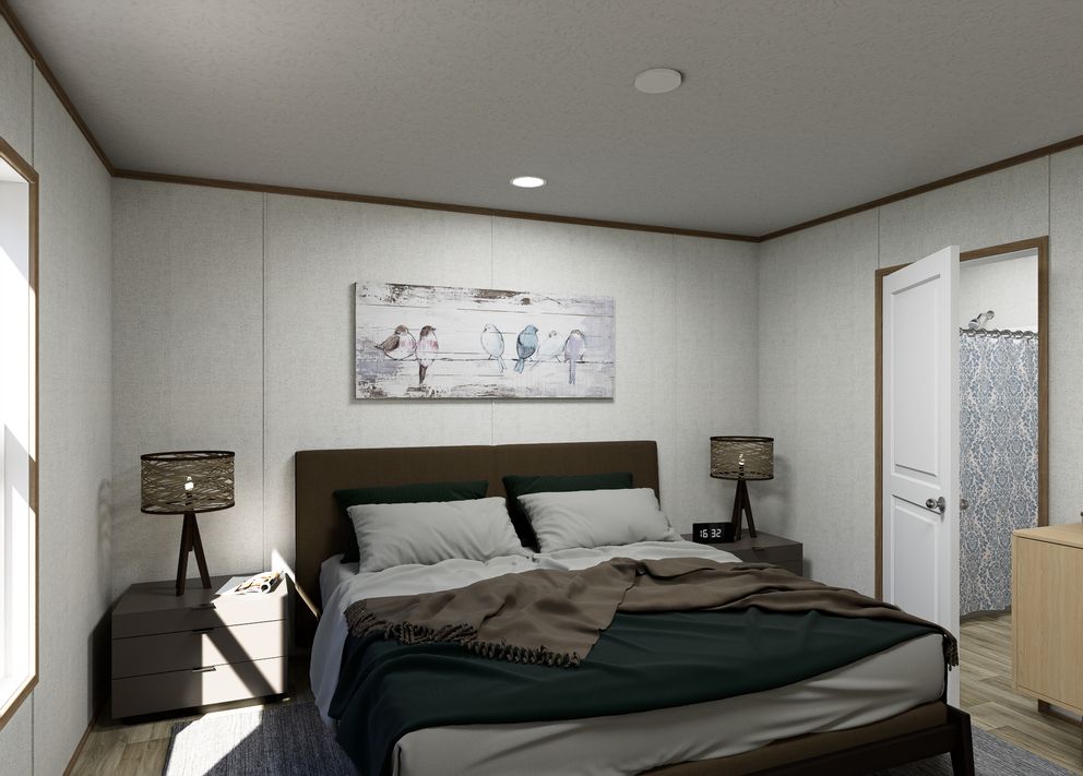 The VISTA Primary Bedroom. This Manufactured Mobile Home features 3 bedrooms and 2 baths.