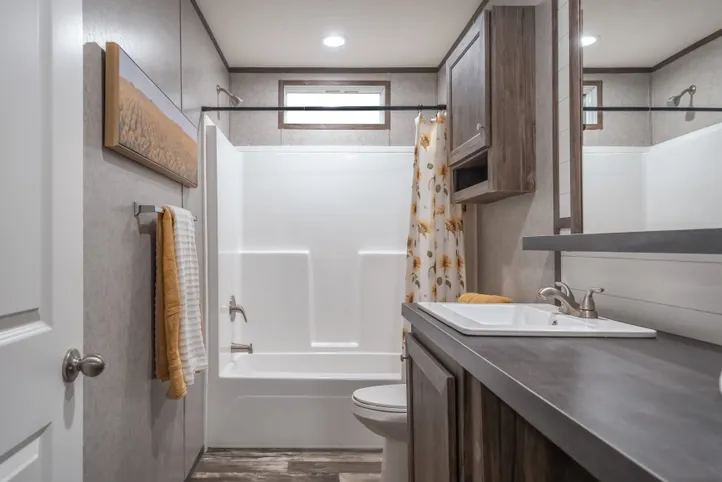 The LOCKLEAR Exterior. This Manufactured Mobile Home features 4 bedrooms and 2 baths.