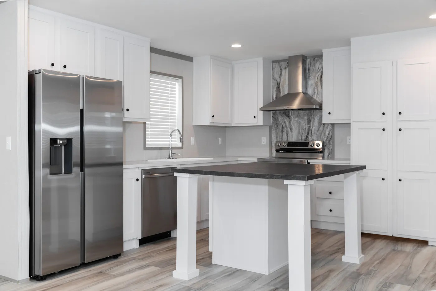 The THE PANTRY HOUSE Kitchen. This Manufactured Mobile Home features 3 bedrooms and 2 baths.