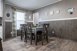 The TRADITION 48 Dining Room. This Manufactured Mobile Home features 3 bedrooms and 2 baths.
