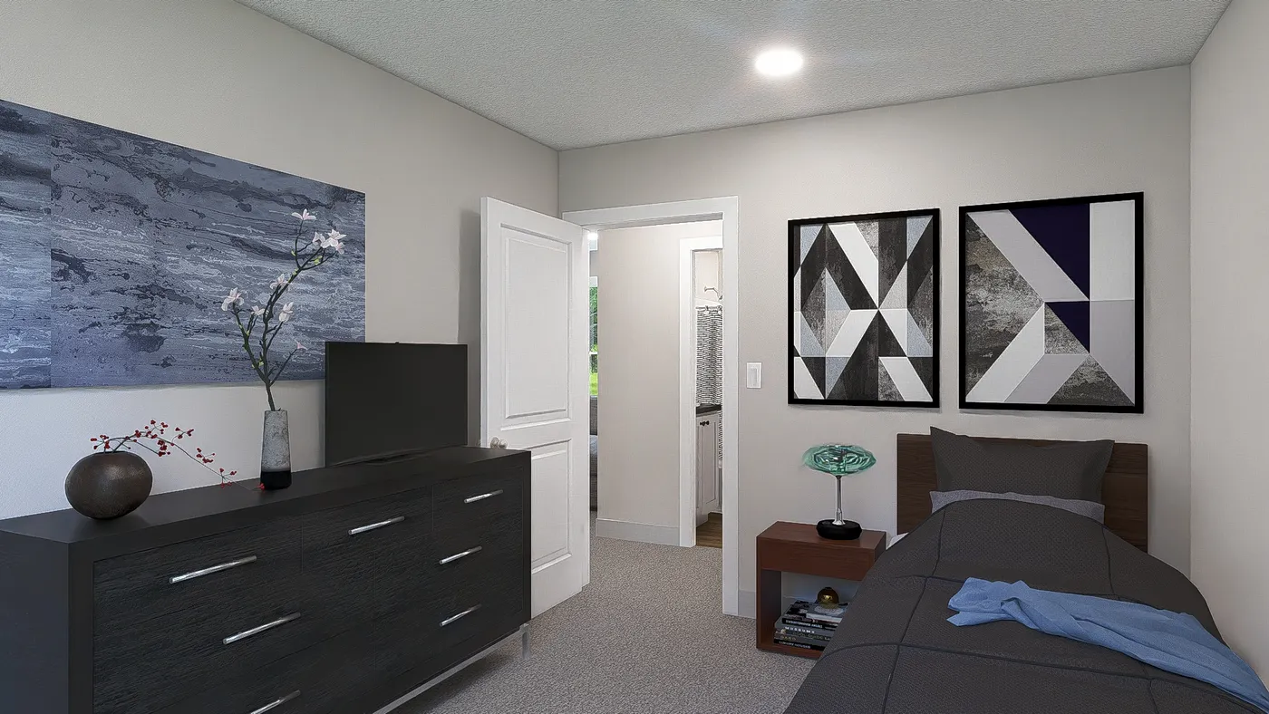 The HERE COMES THE SUN Guest Bedroom. This Manufactured Mobile Home features 3 bedrooms and 2 baths.