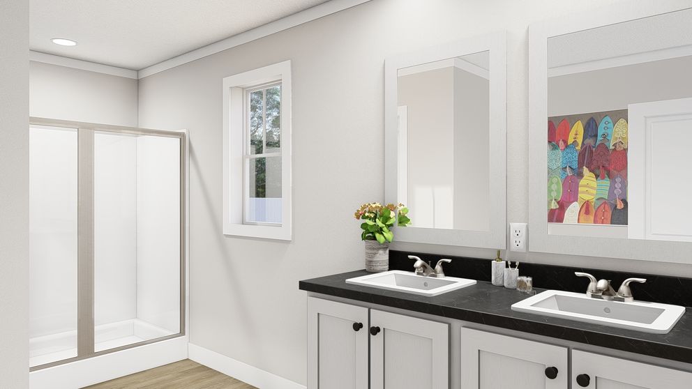 The LIMELIGHT Primary Bathroom. This Manufactured Mobile Home features 3 bedrooms and 2 baths.