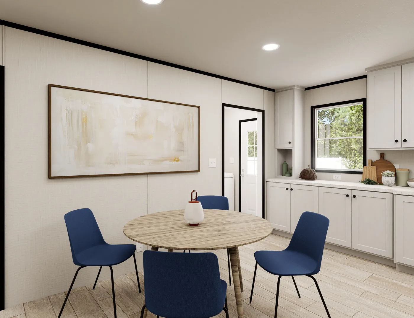 The ULTRA FLEX Dining Area. This Manufactured Mobile Home features 3 bedrooms and 2 baths.