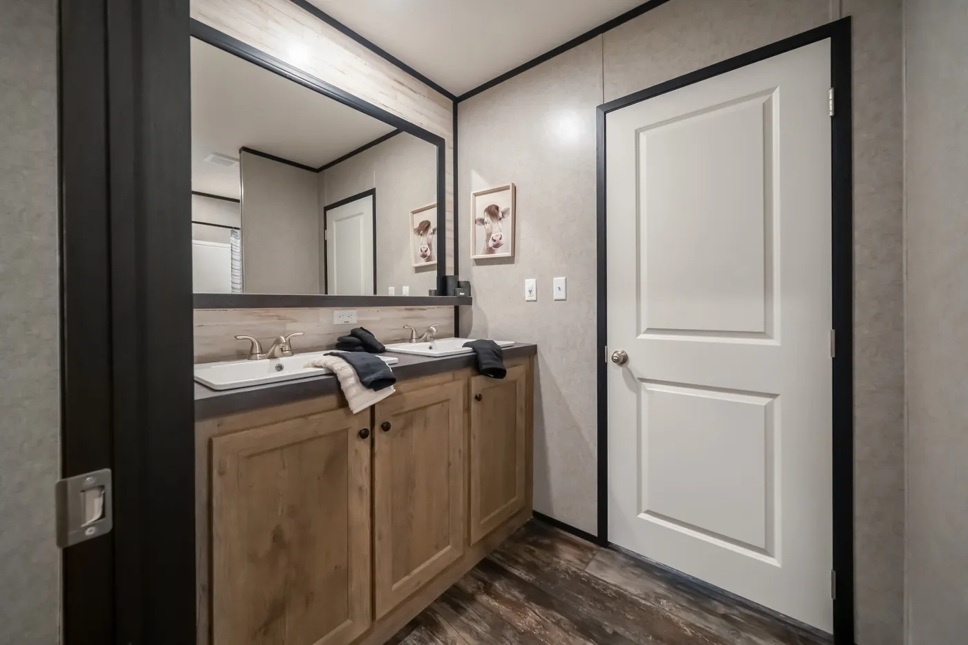The THE TRIBUTARY Guest Bathroom. This Manufactured Mobile Home features 3 bedrooms and 2 baths.