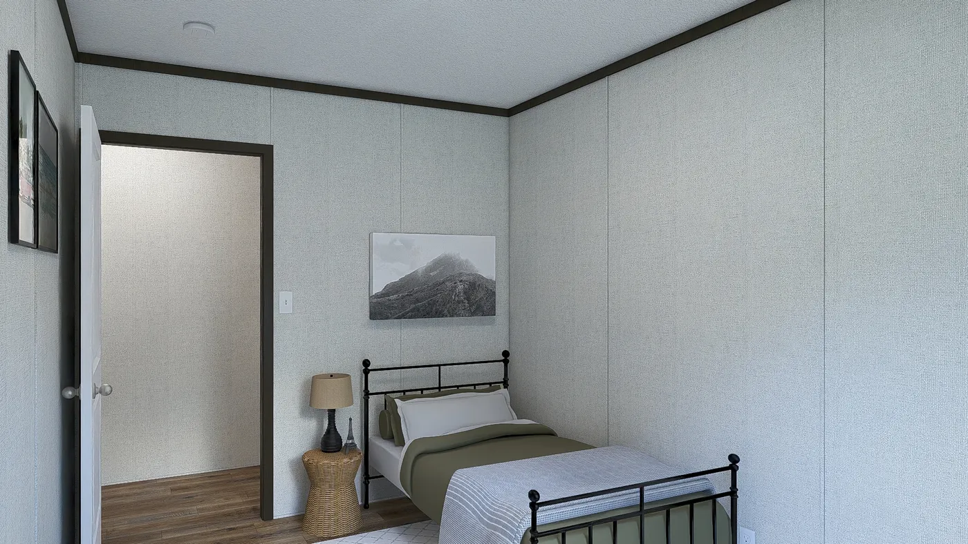 The DESIRE Guest Bedroom. This Manufactured Mobile Home features 3 bedrooms and 2 baths.