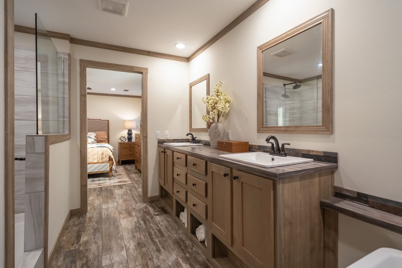 The BOUJEE PREMIER Primary Bathroom. This Manufactured Mobile Home features 4 bedrooms and 2 baths.