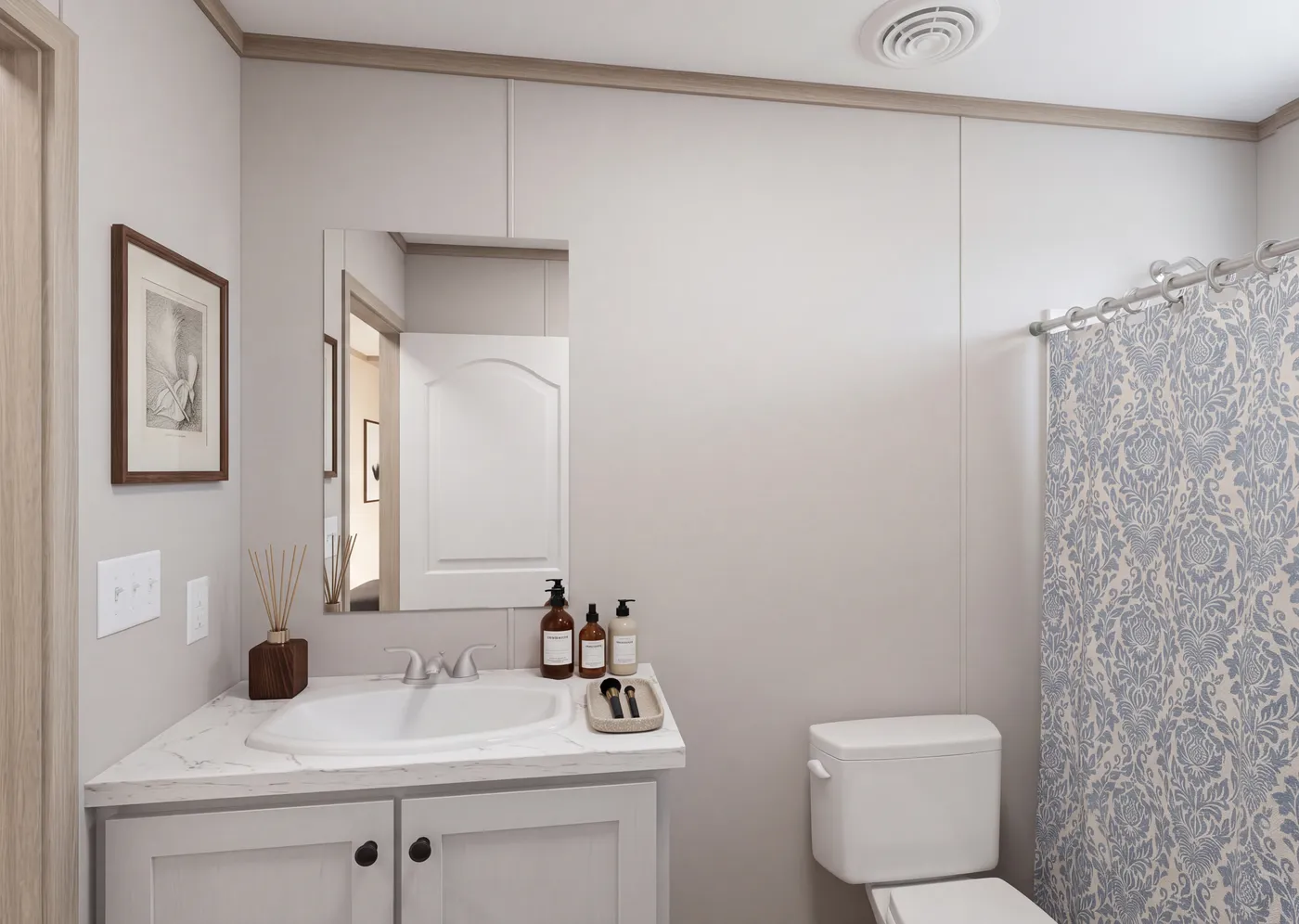 The THE MOUNTAINEER 76 Guest Bathroom. This Manufactured Mobile Home features 4 bedrooms and 2 baths.