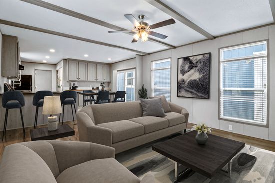 The ANNIVERSARY 16763A Living Room. This Manufactured Mobile Home features 3 bedrooms and 2 baths.