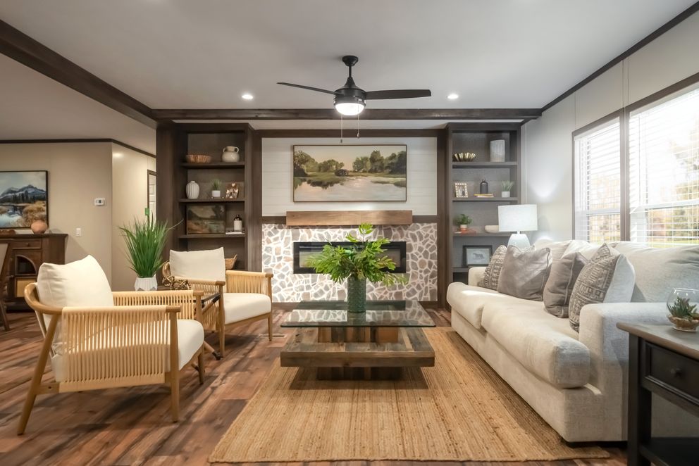 The MOUNTAIN VIEW Living Room. This Manufactured Mobile Home features 3 bedrooms and 2 baths.