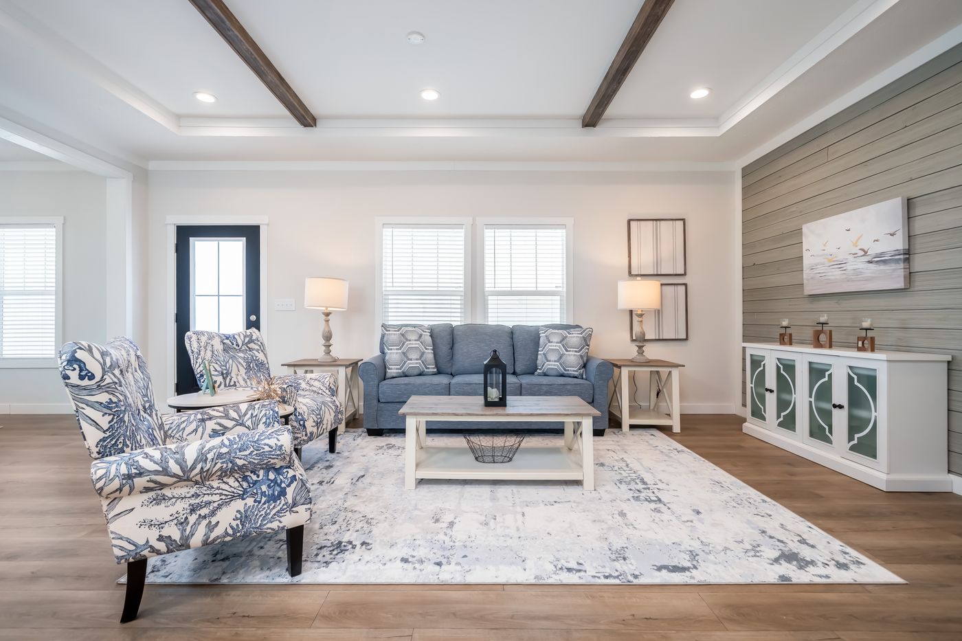 The 3459 MOD 64X28 CAROLINA Living Room. This Modular Home features 3 bedrooms and 2 baths.