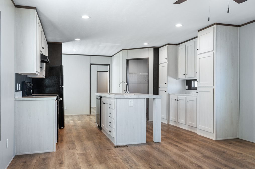 The SELECT 16722A Kitchen. This Manufactured Mobile Home features 2 bedrooms and 2 baths.