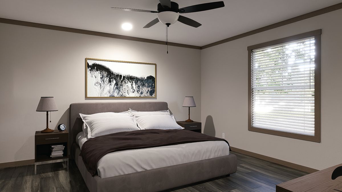 The EMILIE ELITE Primary Bedroom. This Manufactured Mobile Home features 3 bedrooms and 2 baths.