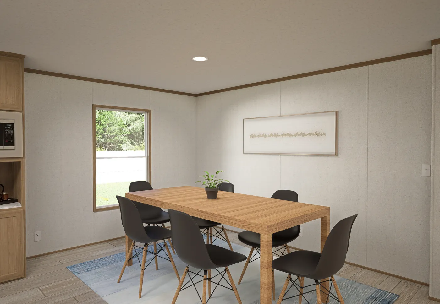 The THE MOUNTAINEER 68 Dining Area. This Manufactured Mobile Home features 4 bedrooms and 2 baths.