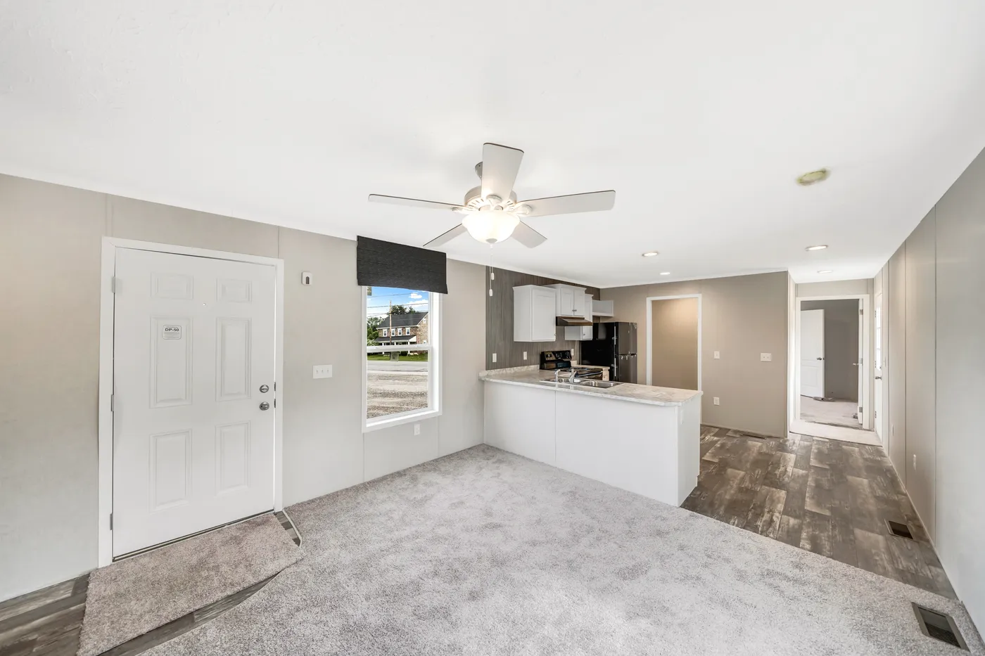 The RUBY Living Room. This Manufactured Mobile Home features 2 bedrooms and 2 baths.