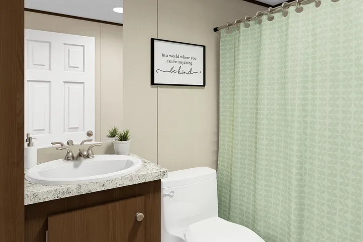 The DELIGHT Primary Bathroom. This Manufactured Mobile Home features 2 bedrooms and 2 baths.