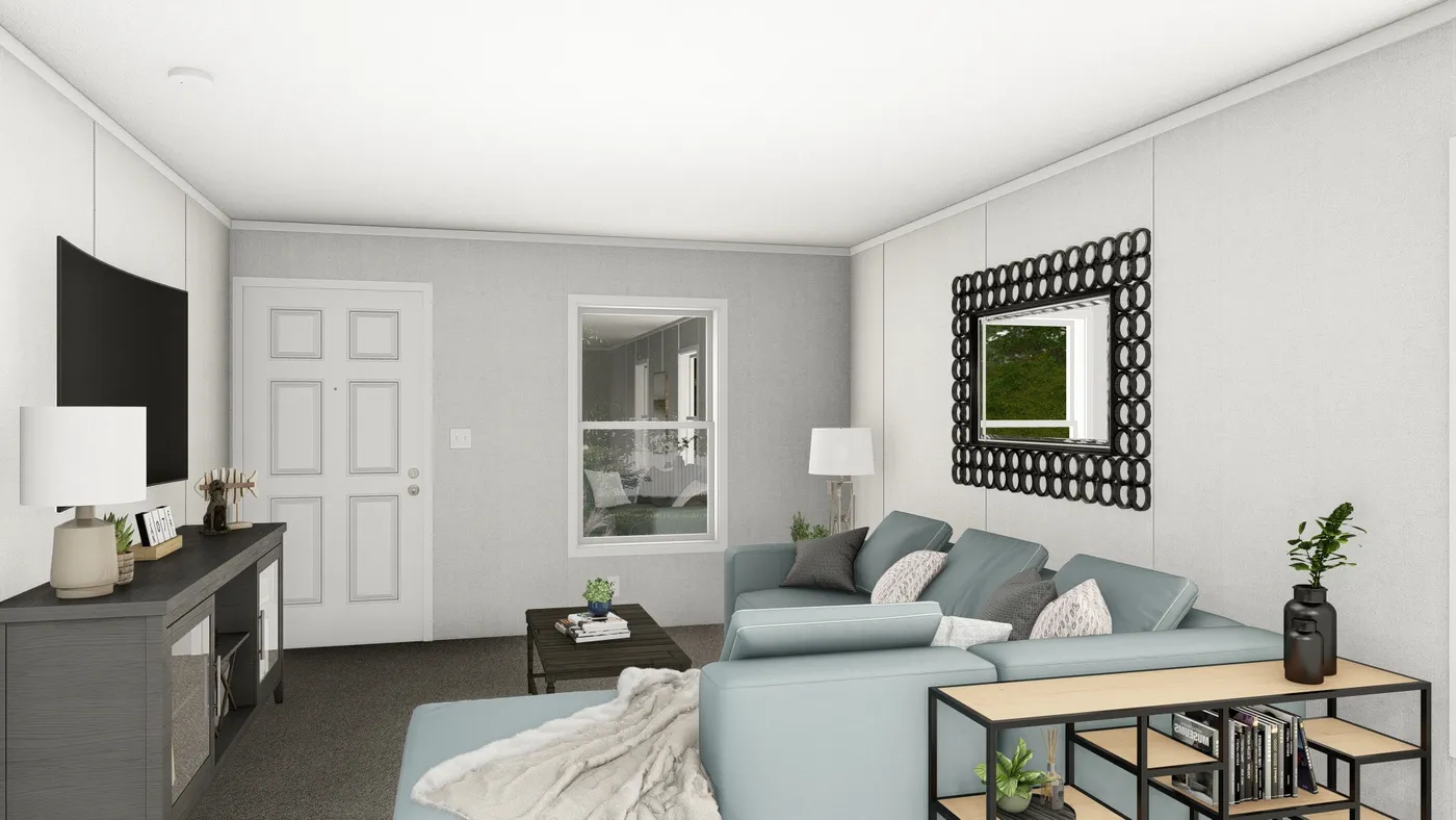 The JADE Living Room. This Manufactured Mobile Home features 2 bedrooms and 1 bath.