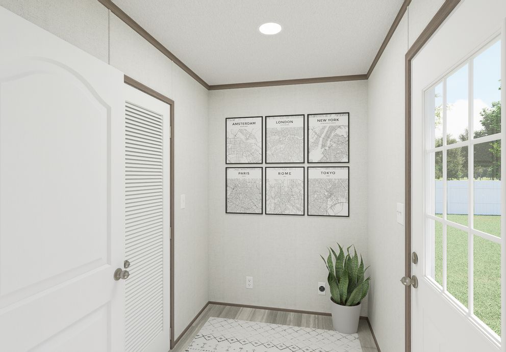 The THE MOUNTAINEER 64 Utility Room. This Manufactured Mobile Home features 3 bedrooms and 2 baths.
