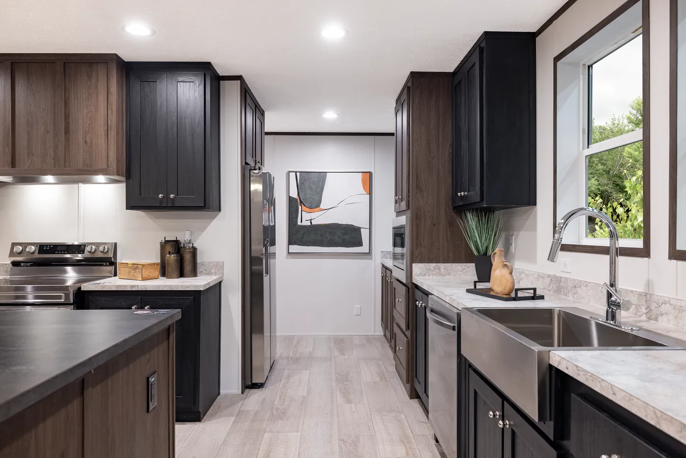 The CRESTWOOD Kitchen. This Manufactured Mobile Home features 3 bedrooms and 2 baths.
