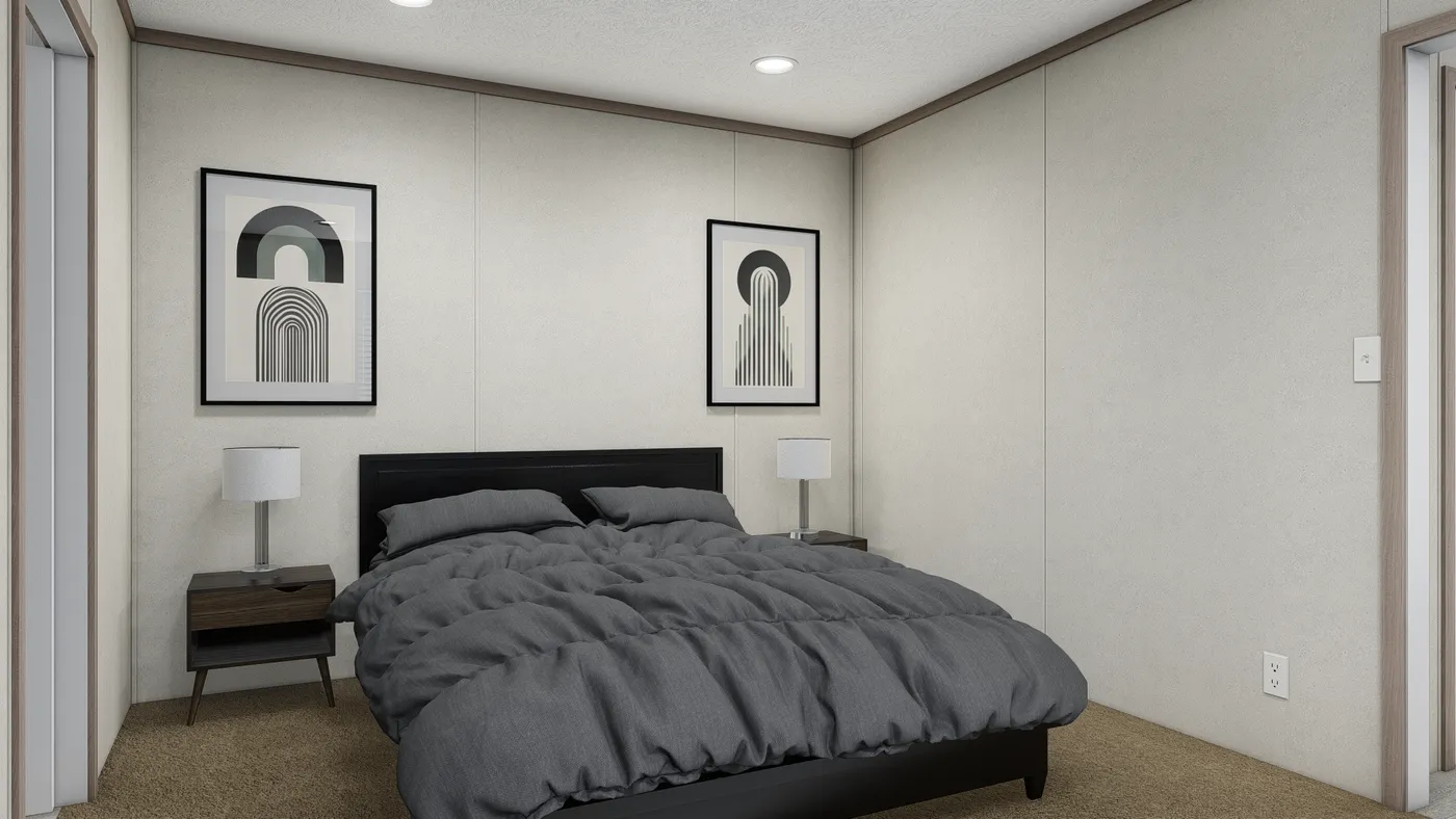 The 6016-4711 THE PULSE Primary Bedroom. This Manufactured Mobile Home features 2 bedrooms and 2 baths.