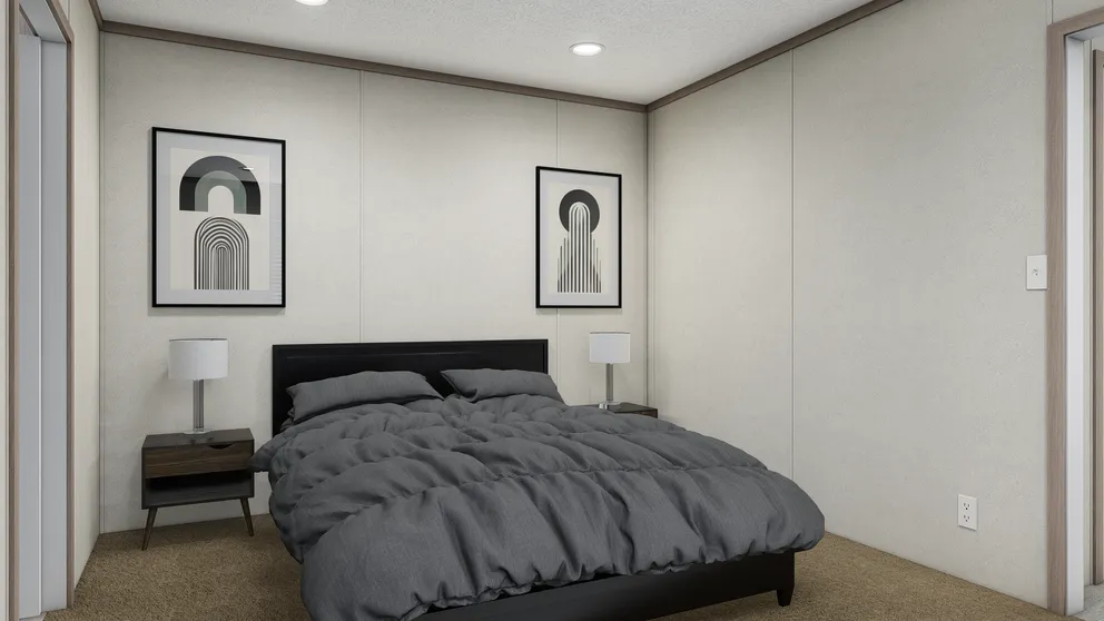 The 6016-4711 THE PULSE Primary Bedroom. This Manufactured Mobile Home features 2 bedrooms and 2 baths.