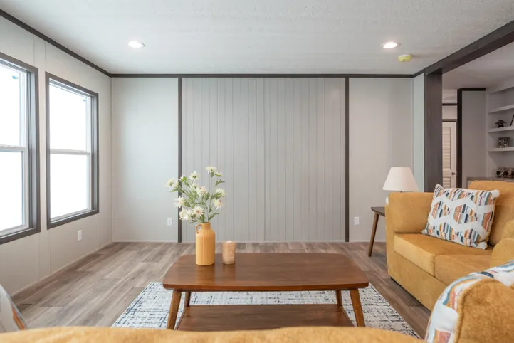 The EMPOWER Living Room. This Manufactured Mobile Home features 4 bedrooms and 2 baths.